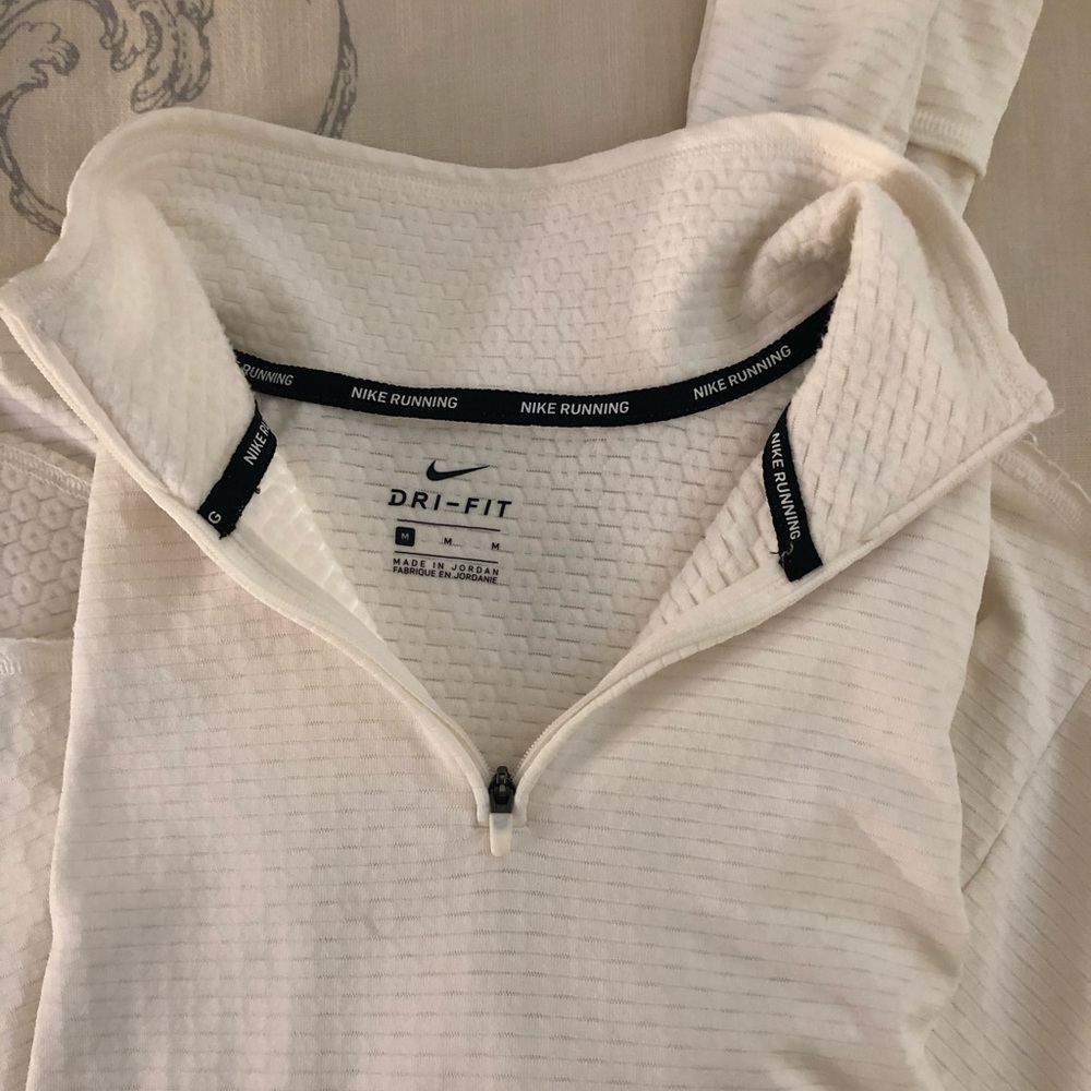 Nike dry fit quarter zip. Never worn.